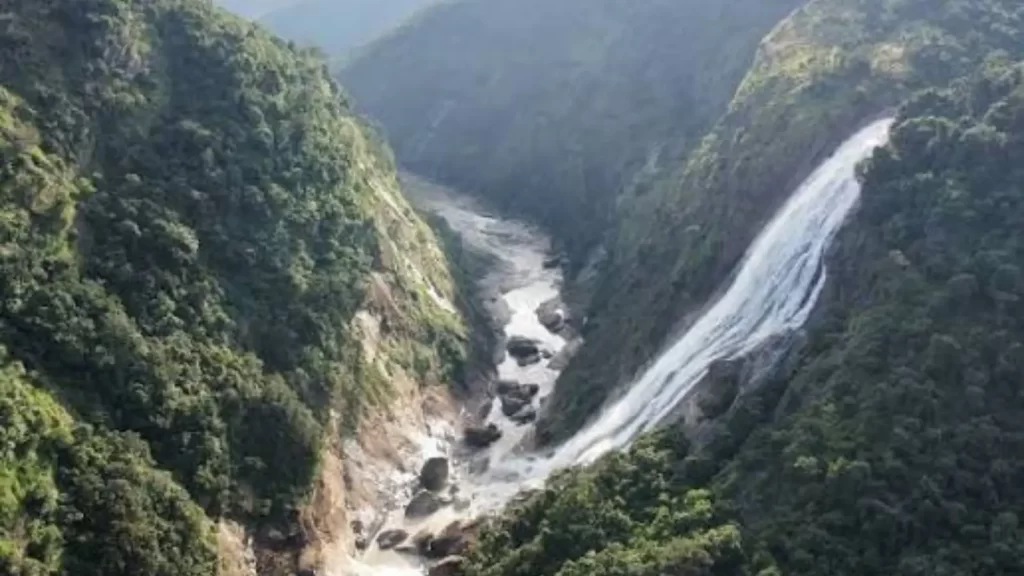 Duduma Waterfall surrounded by green hills in Odisha