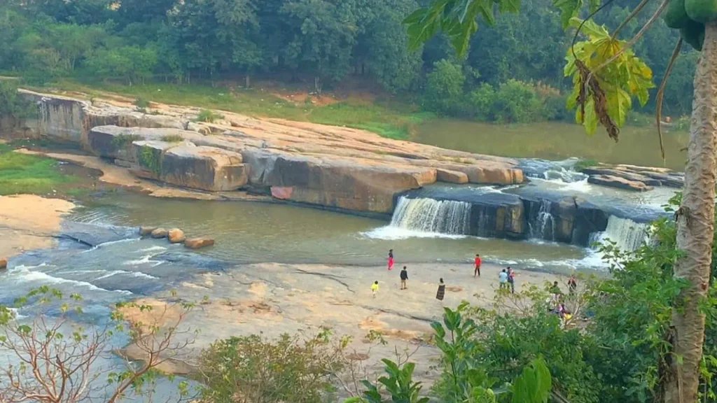 Taptapani hot spring surrounded by green hills in Odisha